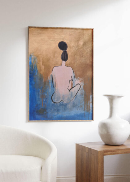artwork with gold and blue paint hanging on the wall